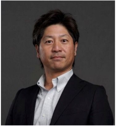 Headshot of professional in business attire
