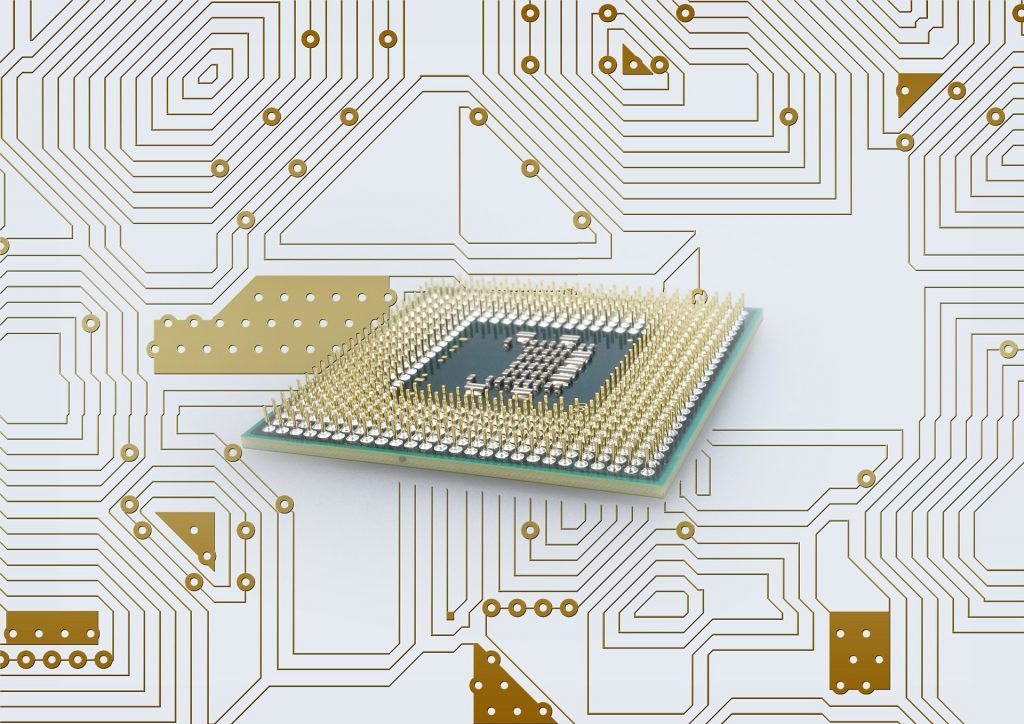 3D 回路基板上に実装され、ピンが接続されたマイクロプロセッサの図解