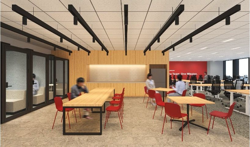 Modern office interior with wooden wall panel and red chairs